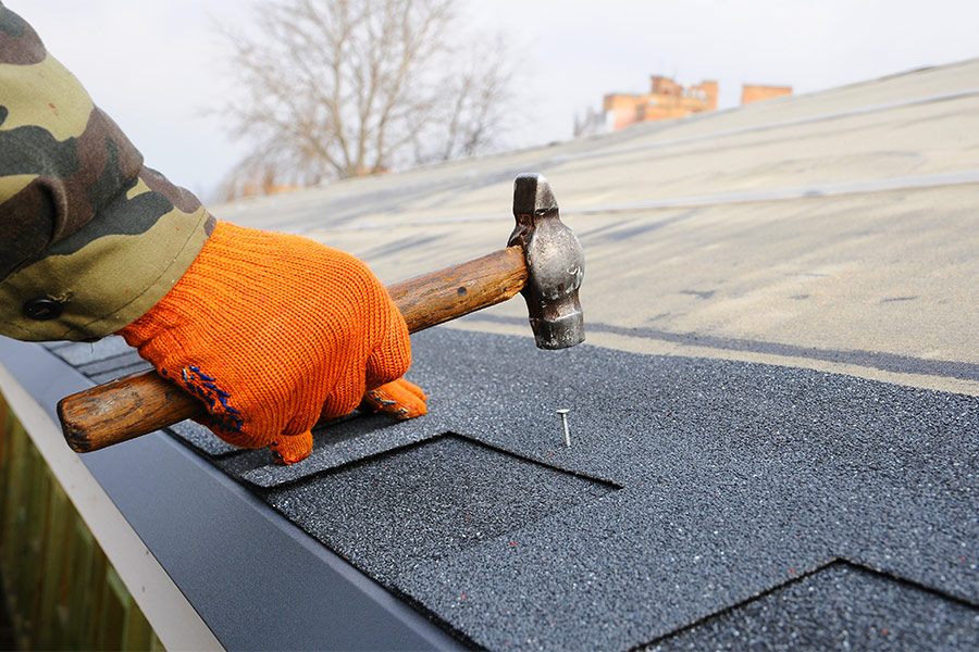 hammer and nail with asphalt shingles fort worth tx