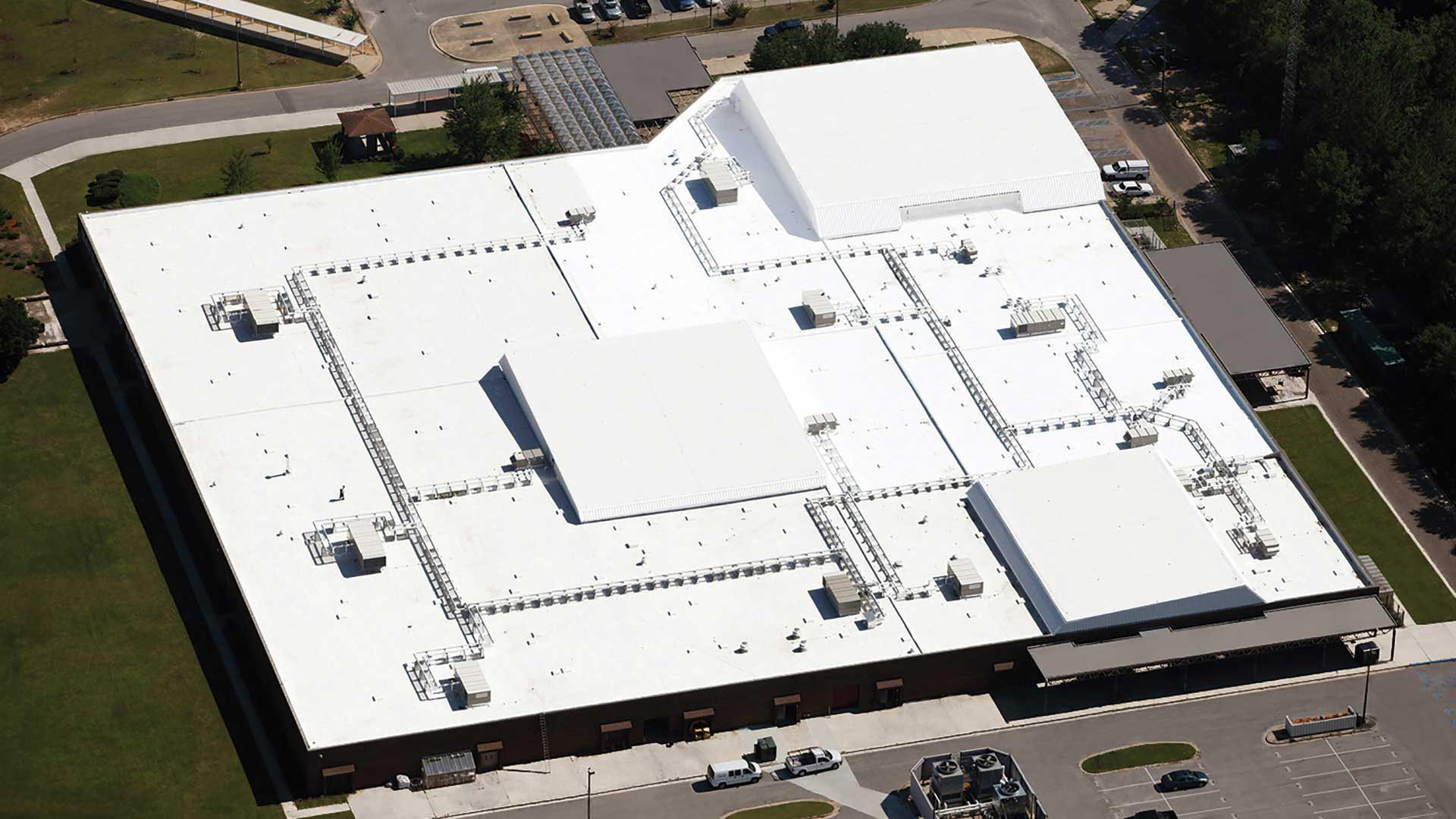 aerial view of commercial building with roof installed arlington tx